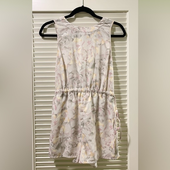 Urban Outfitters Dresses & Skirts - ✨PASTEL FLORAL ROMPER✨